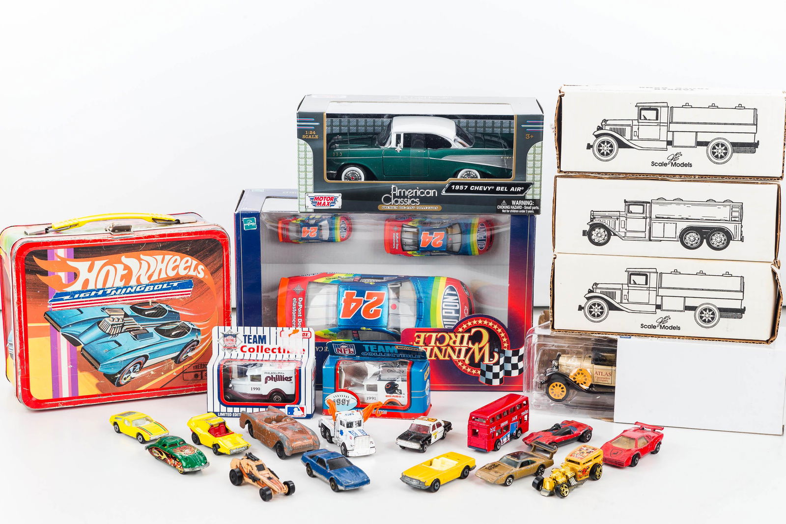 1969 Hot Wheels Lunch Box and Die Cast Vehicles: Lunch box has overall good graphics with a lightning bolt sticker applied to front (can be removed). Lot also includes 3 banks in box, Winner's Circle Jeff Gordon set, American Classics Chevy Bel Air,