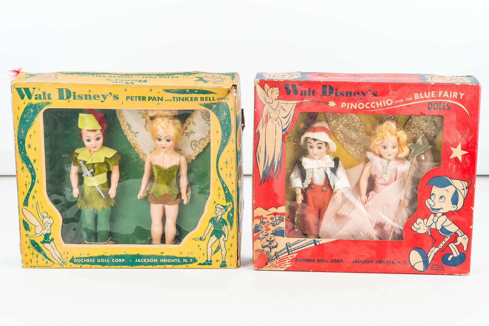 Vintage Disney Peter Pan and Pinocchio Dolls IOB: Pinocchio and the Blue Fairy doll set in original box (box in overall good condition, marked Copyright Walt Disney Productions, appears to be complete), and a Peter Pan and Tinker Bell doll set in ori