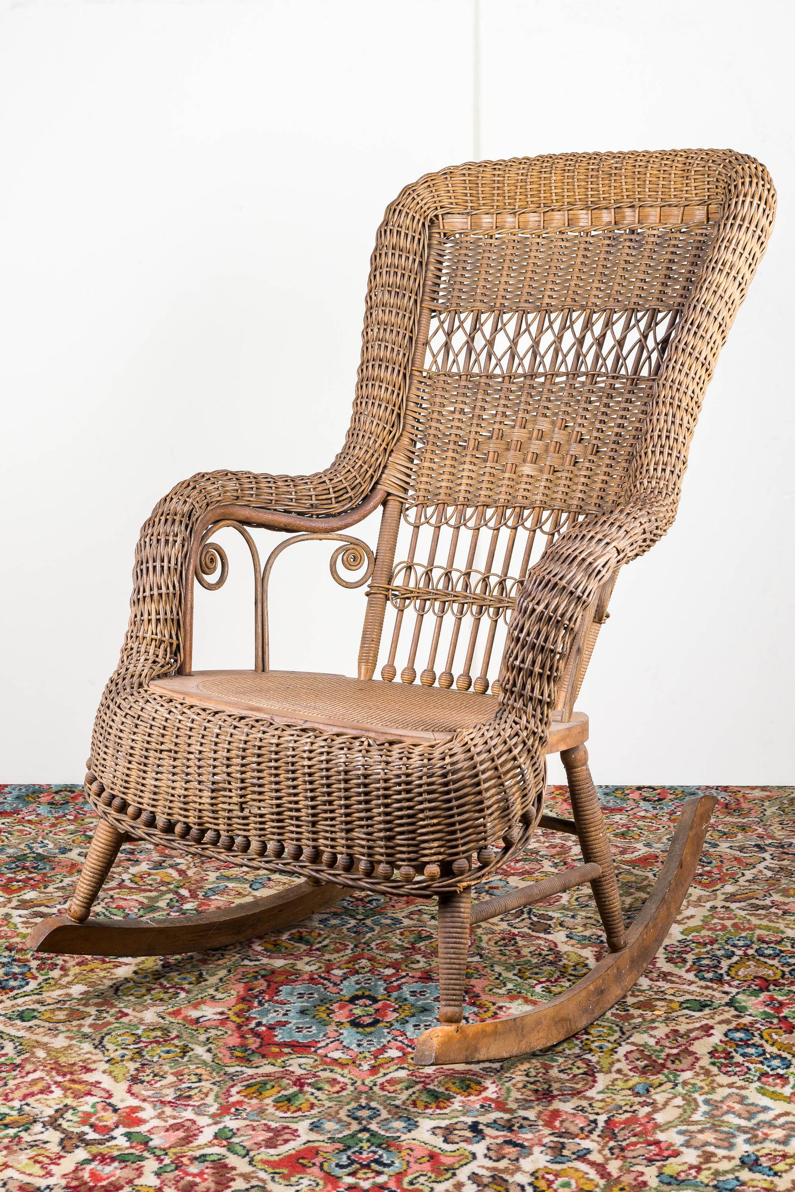 Victorian Style Wicker Rocker: Rocker measures approx. 37" high and is in overall good condition.