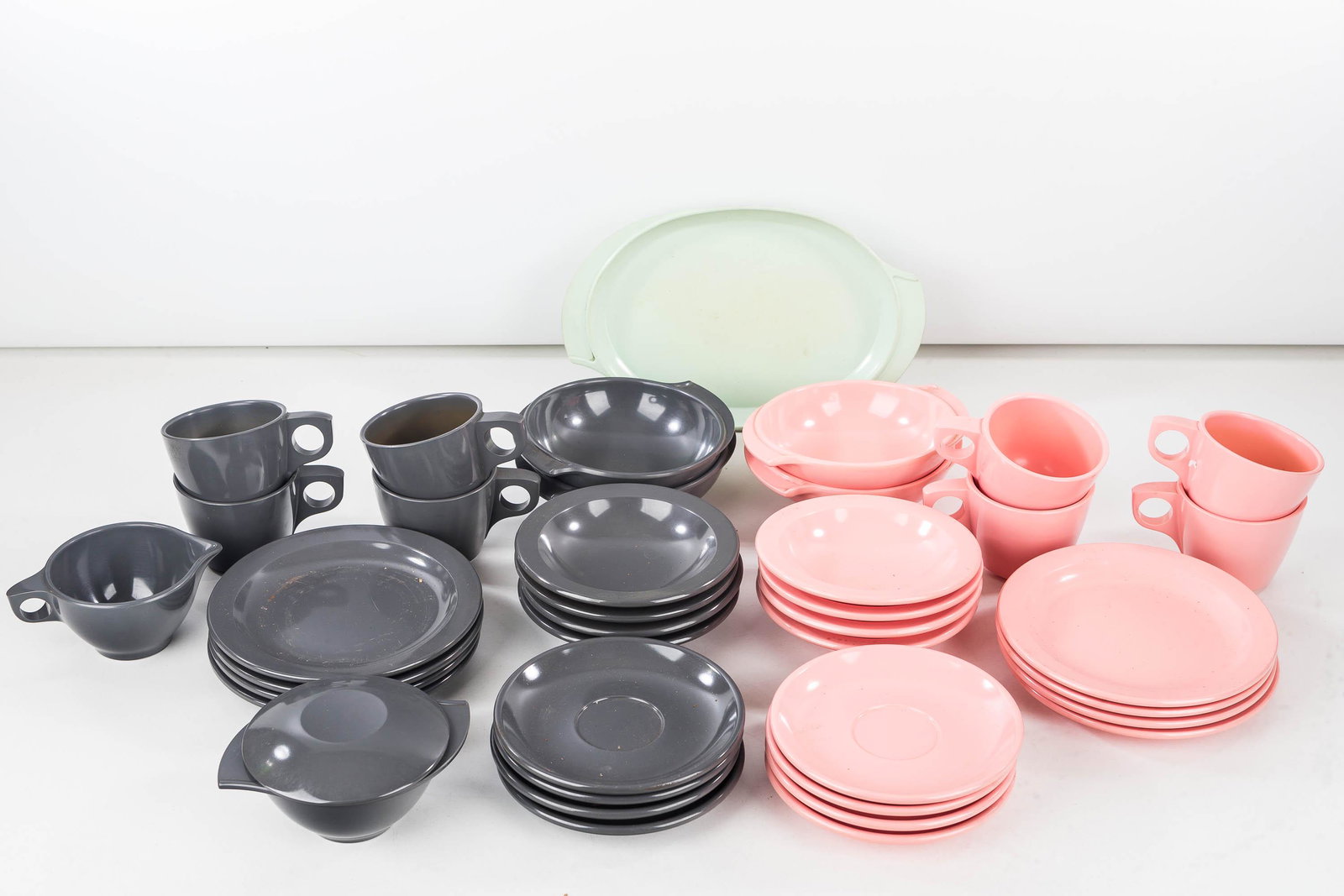 Large Collection of Boonton Kitchenware: Including various pieces of pink, grey kitchenware. 20 pcs. of grey and 18 pcs. of pink and one green item.