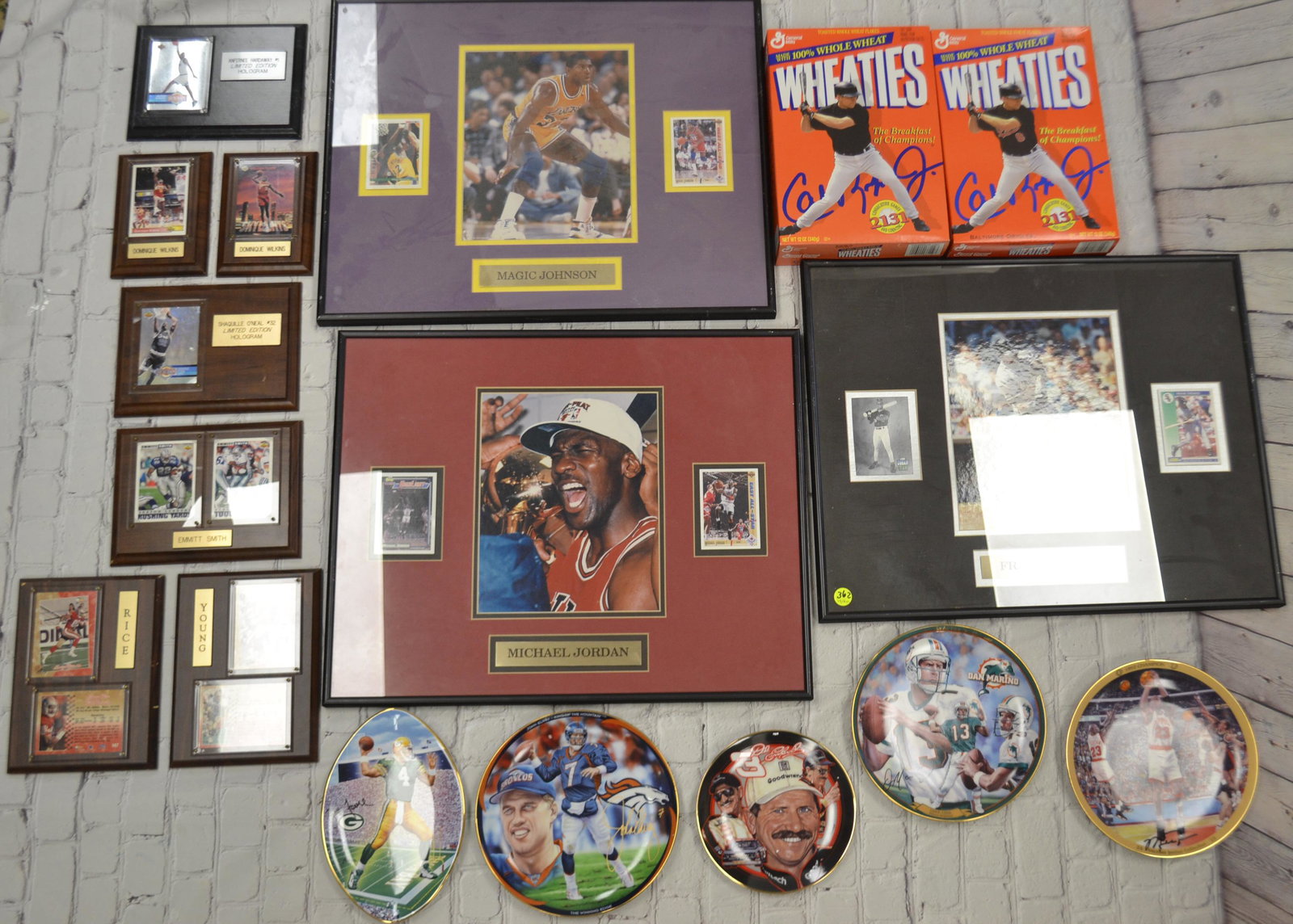Collection of Sports Plaques, Plates, Boxes: Plaques include 3 large framed with sports cards and picture for Michael Jordan, Magic Johnson and Frank Thomas. Plaques also for 3 football and 4 basketball with cards. Five collector plates (most Br