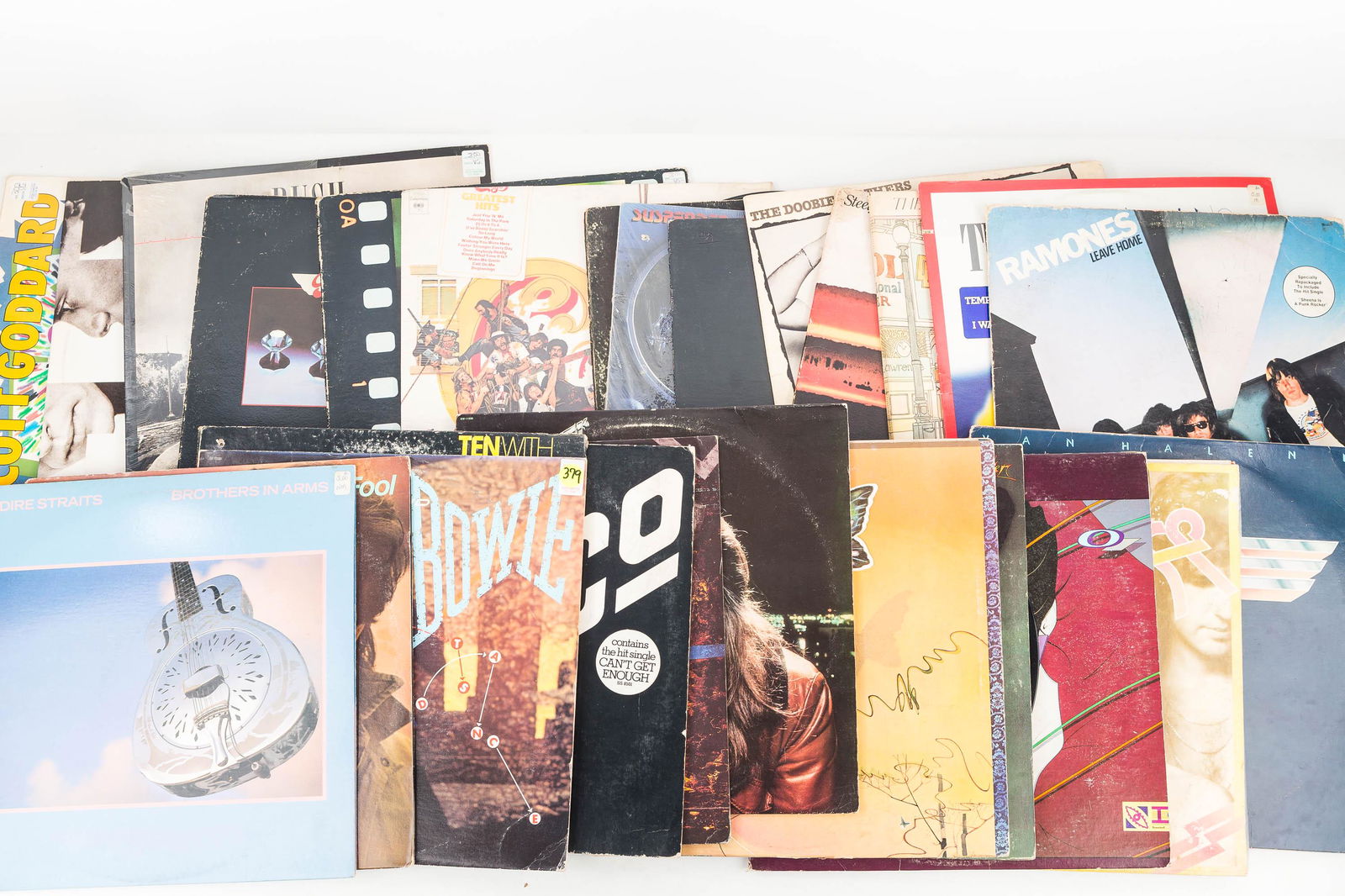 Collection of 33 RPM Rock-n-Roll Records: 27 records including David Bowe, Bad Company, London Howlin Wolf Session, Aerosmith, Ramones, and others