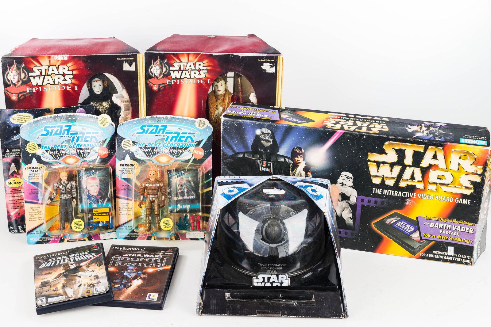 Star Wars and Star Trek items NIB: Most NIB (new in box) including 3 Star Wars Next Generation figures dated 1993, 2 Star Wars Play Station 2 games, 2 1999 Star Wars Queen Amidala, Star Wars interactive board and Star Wars Droid Fighte