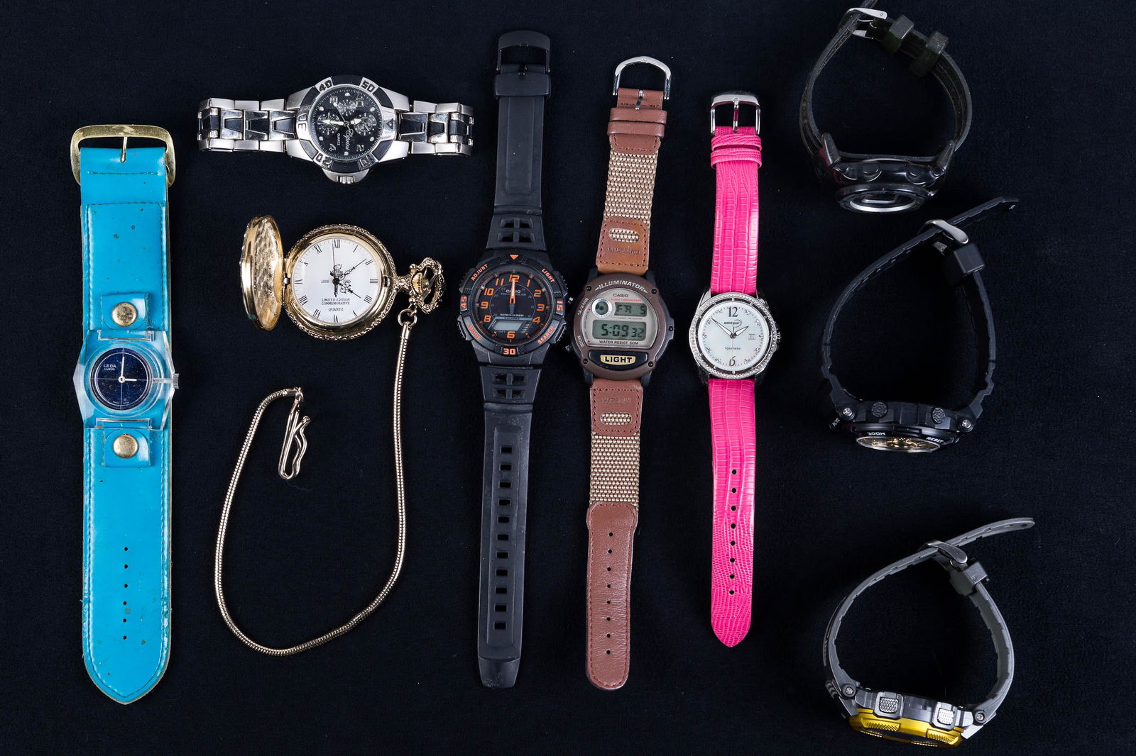 Wristwatches Grouping: Lot includes a Caprini Quartz Divers watch, an Armitron WR330, an Armitron Alarm Chrono, a Casio alarm chronograph, other wristwatches, and Statue of Liberty commemorative pocket watch.