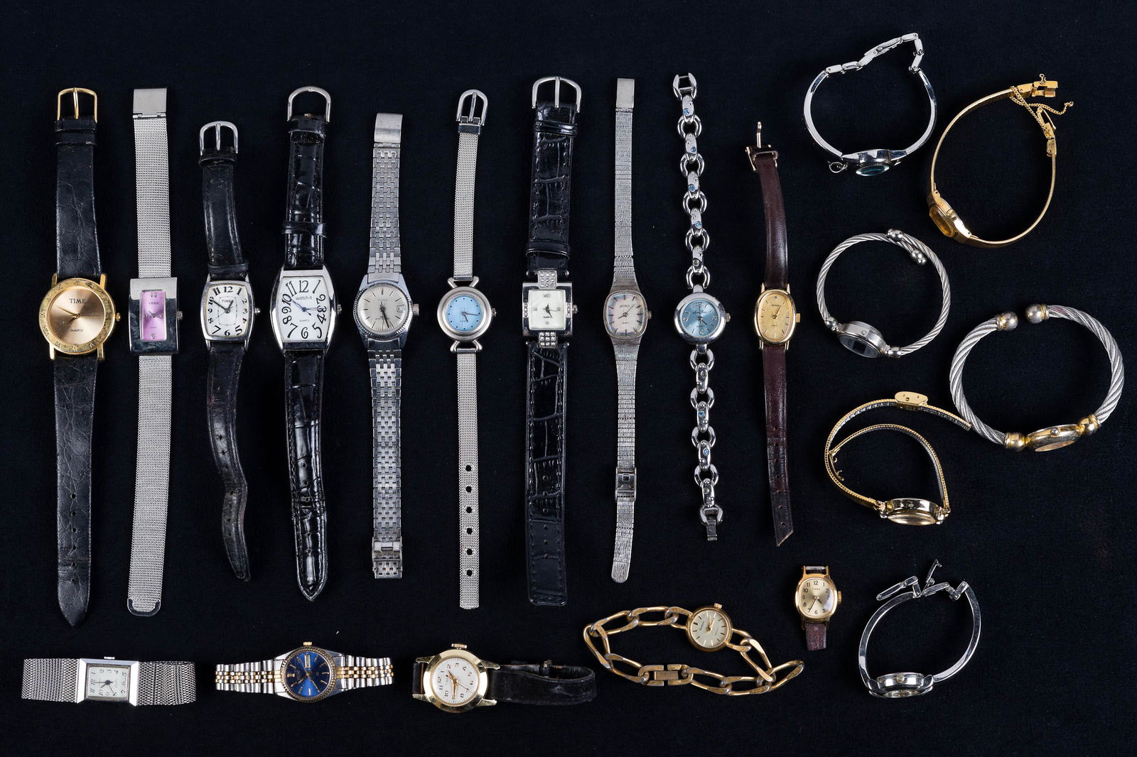 Collection of Ladies Watches: Lot includes watches by Acqua, Seiko with blue face and day/date, Aspen Diamond Quartz, Armitron Quartz, and many others.