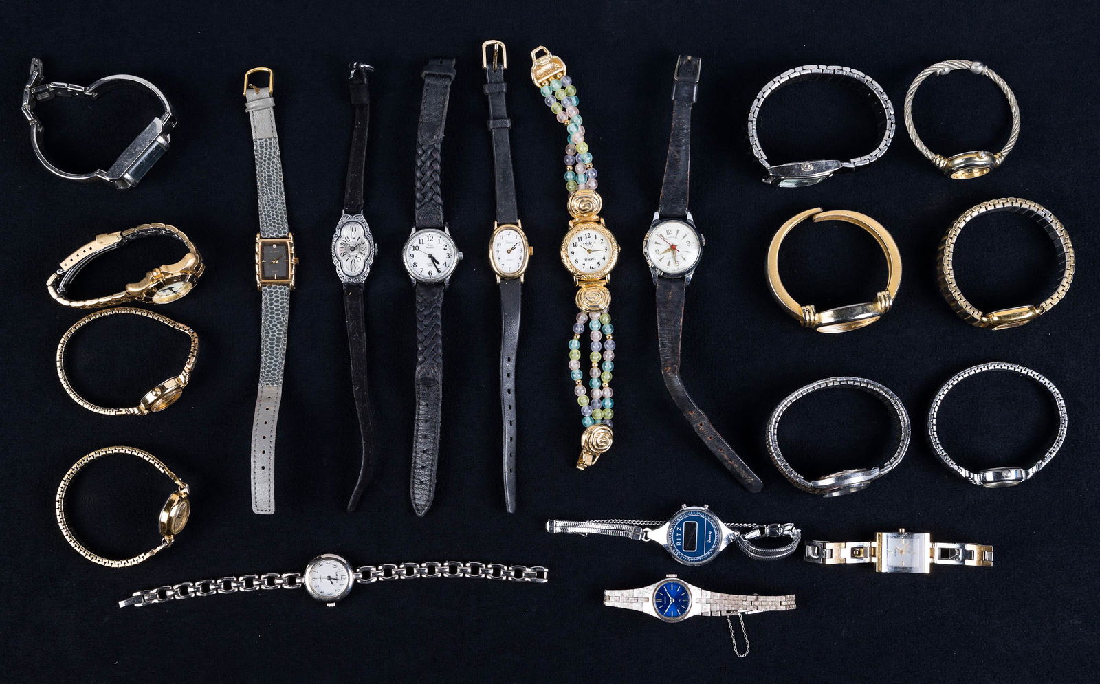 Collection of Ladies Watches: Lot includes watches by Fossil with rectangular face, Carriage, Guess, Nelson 17 Jewel (marked Swiss Made), Advance, and various others.