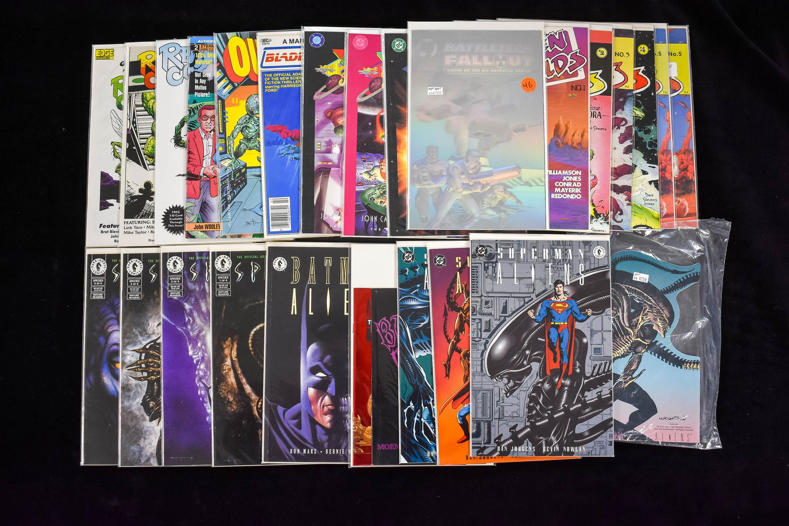 Aliens, Species + other Comic Books (25 total): 3 Superman Aliens by DC Comics and Dark Horse Comics, a Batman Aliens by Dark Horse and DC Comics, Batman Dark Joker the Wild with Aliens Predator (smaller size foil comics), Species no.1-4, Battletec