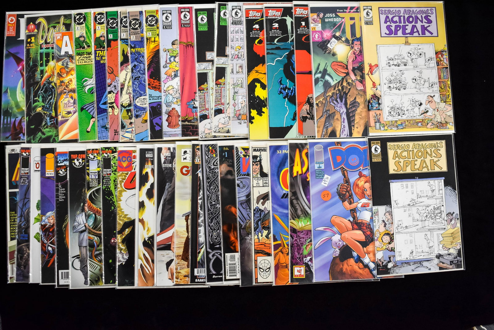 Adventure Comic Books Grouping (40 total): 1 Foil cover Dollz no.1 by Image Comics, Fray foil cover no.1, seven Sergio Aragone's Actions Speak, 3 Dracula by Tops Comics, 4 Stanley and His Monster by DC Comics, 2 Angel and the Ape by DC Comics,