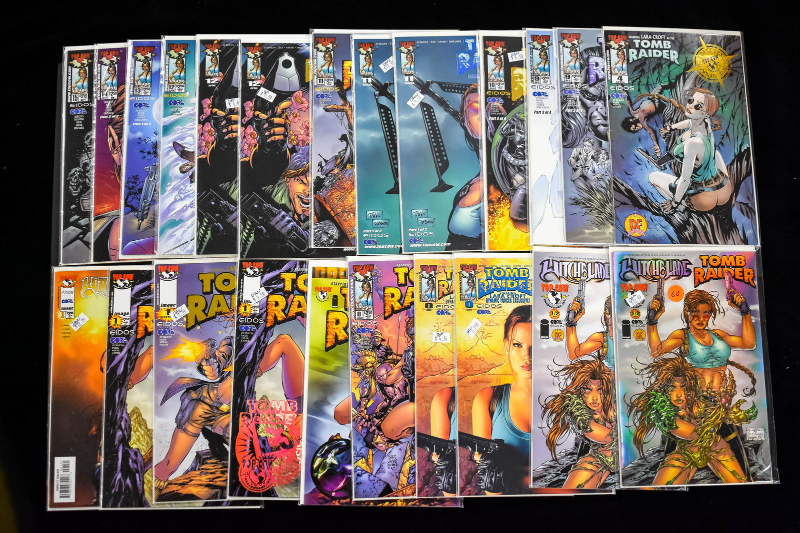 Tomb Raider Comic Books (23 total): Tomb Raider comics including 2 versions of Witchblade Tomb Raider #1/2 and one is a hologram, 2 versions of Tomb Raider no.0 both with COA and one is foiled, 8 foil covers of which 6 have COAs, and 11