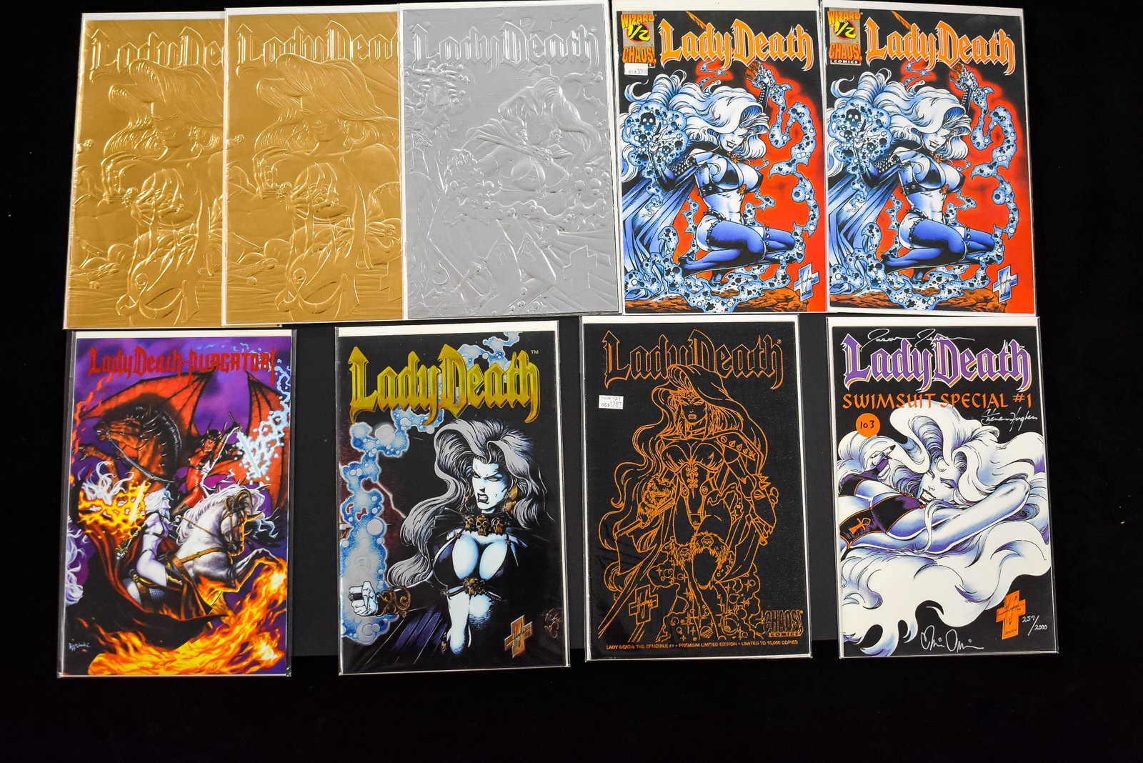 Lady Death Limited Ed Comic Books (9 total): Lady Death Swimsuit Special no.1 signed by creator Brian Pulido, illustrator Steven Hughes and colorist Jason Jensen with COA 257 of 2000, two copied of Wizard Press Lady Death no. 1/2, both with COAs