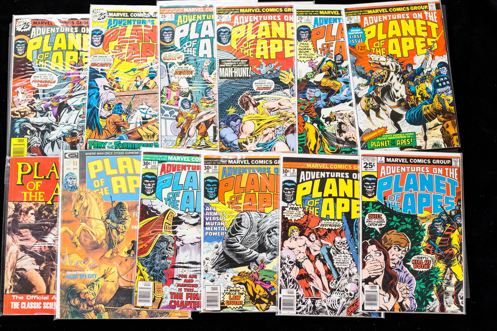 Planet of the Apes Comics (14): Marvel's Adventures on the Planet of the Apes, 25 cent, issues 1 - 11 plus a duplicate of # 10 and also includes Battle in the Forbidden Zone #2 by Curtis and a paperback titled The Official Adaptatio