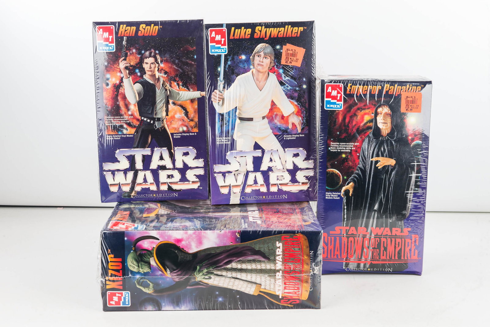 Star Wars Vinyl Model Kits by AMT Ertl (4): Han Solo Kit 9785-1000 (1995), Luke Skywalker Kit 8783-1100 (1995), Emperor Palpatine Kit -8258-1000 (1996), and Xizor Kit 8256-10DO (1997)