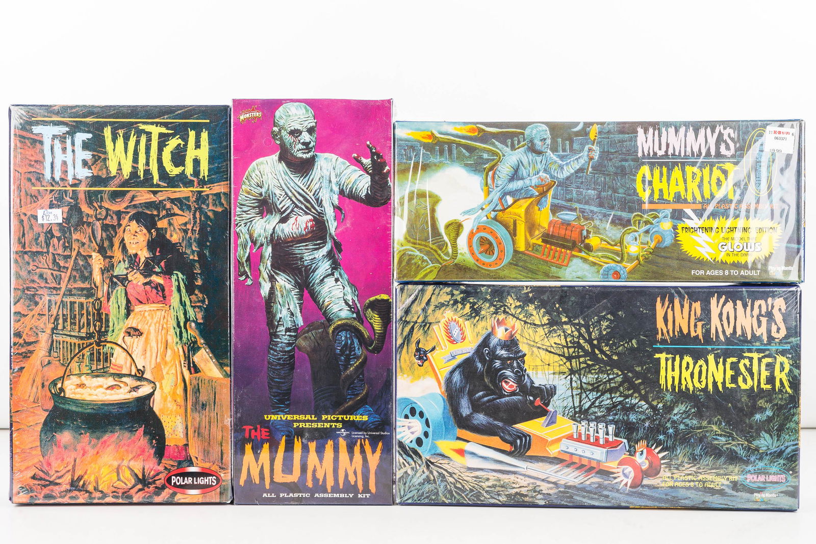 Scifi Polar Lights & Aurora Model Kits (4): Aurora "The Mummy" Kit No. 427-98, Polar Lights "Mummy's Chariot" Kit No.5004, Polar Lights "The Witch" No. 5092, and Polar Lights "King Kong's Thronester; all new old stock in box