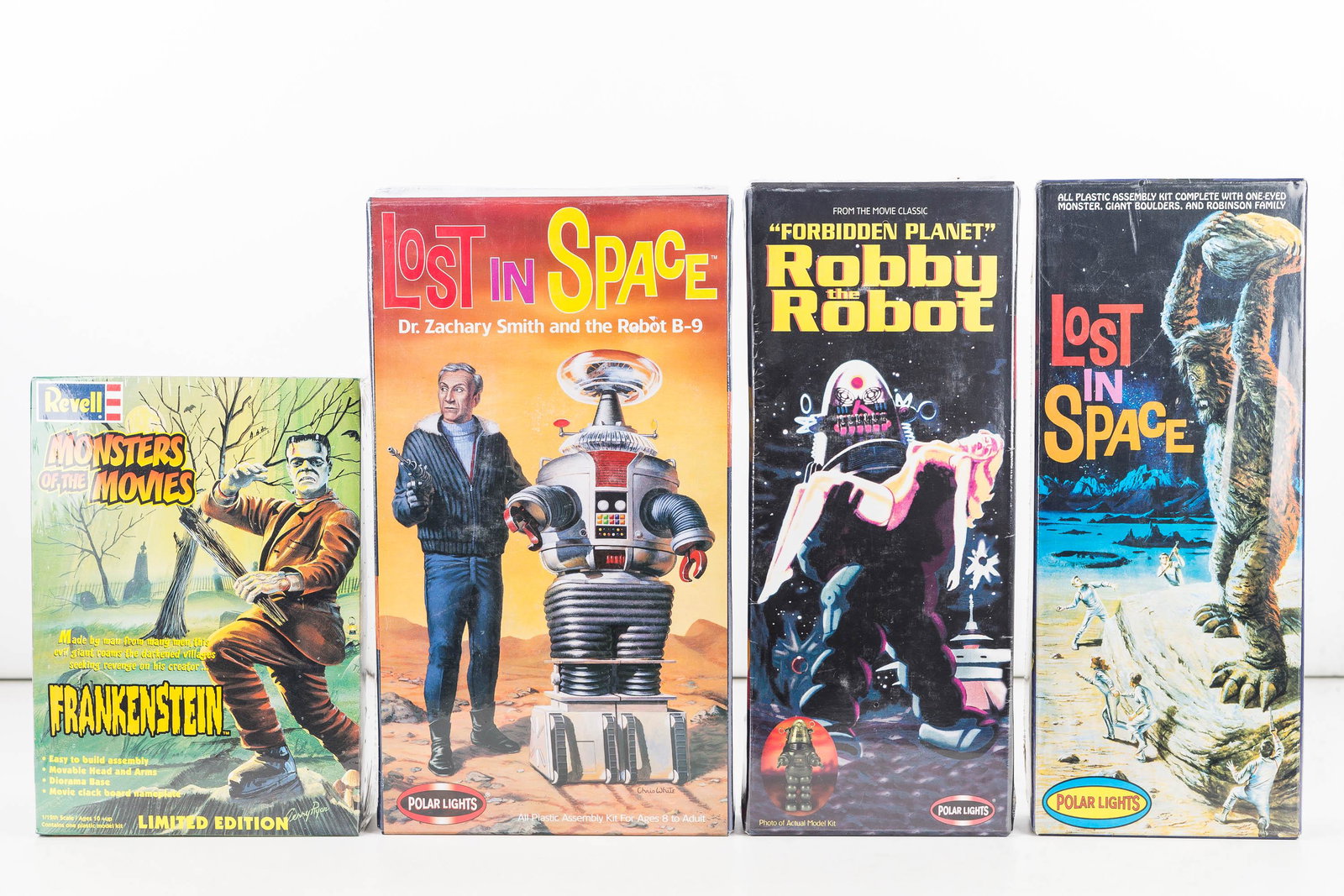 Figure Model Kits (4)/Revell and Polar Lights: Four kits including Monsters of the Movies Frankenstein model c1999 model 85-3633 back corner of box has dent, Polar Lights Lost in Space Dr. Zachary Smith and the Robot B-9 c1999 model#5019, Polar Li