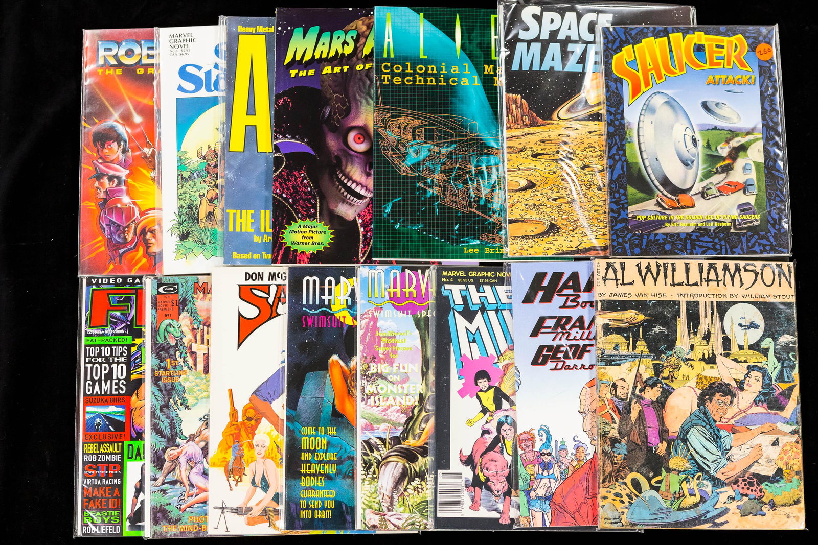 Space and SciFi Books and Magazines: Books include Saucer Attack by Nesheim; Space Mazes by Roger Moreau; Aliens Colonial Marines Technical Manual by Lee Brimmicombe-Wood; Mars Attacks The Art of the Movie by Karen Jones; Heavy Metal pre