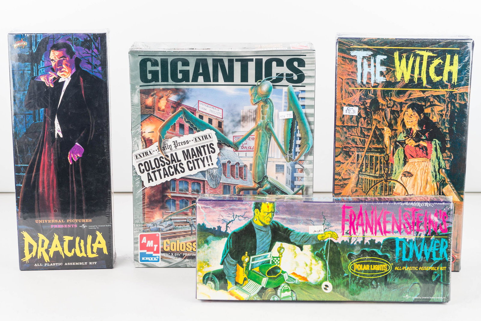 4 Classic Horror Character Models: 2 Polar Lights models are Frankenstein's Flivver #5006 and The Witch #5092. Also includes an AMT Gigantics Colossal Mantis Diorama #8389 and an Aurora Dracula #424-98