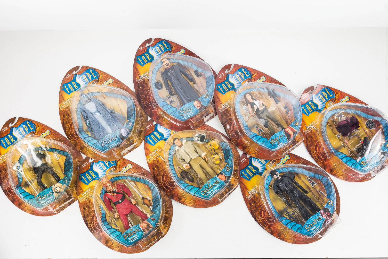 FarScape Action Figures (Series 1 and 2) (8): Made by Toy Vault, c The Jim Henson Co c2001 including 6"- 7" size in original packaging: Aeryn, Scorpius, Bialar Crais, Rygel, Chiana, Zhaan, Ka D'Argo, John Crichton. Some bends to boxes hang tags.