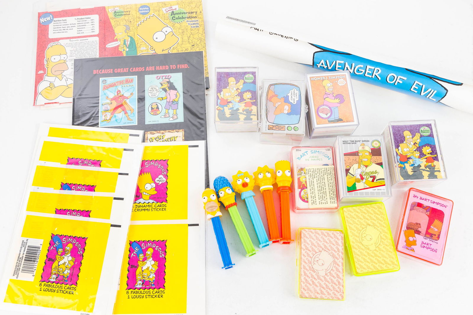 Simpson's Pez Dispensers and Collector Cards: Set of 5 Pez dispensers reflecting the Matt Groening's Simpson family; 4 sets of Cromy Simpson's collector cards; 5 other Simpson's card sets by Topps and Skybox. also includes some wrappers, cards an