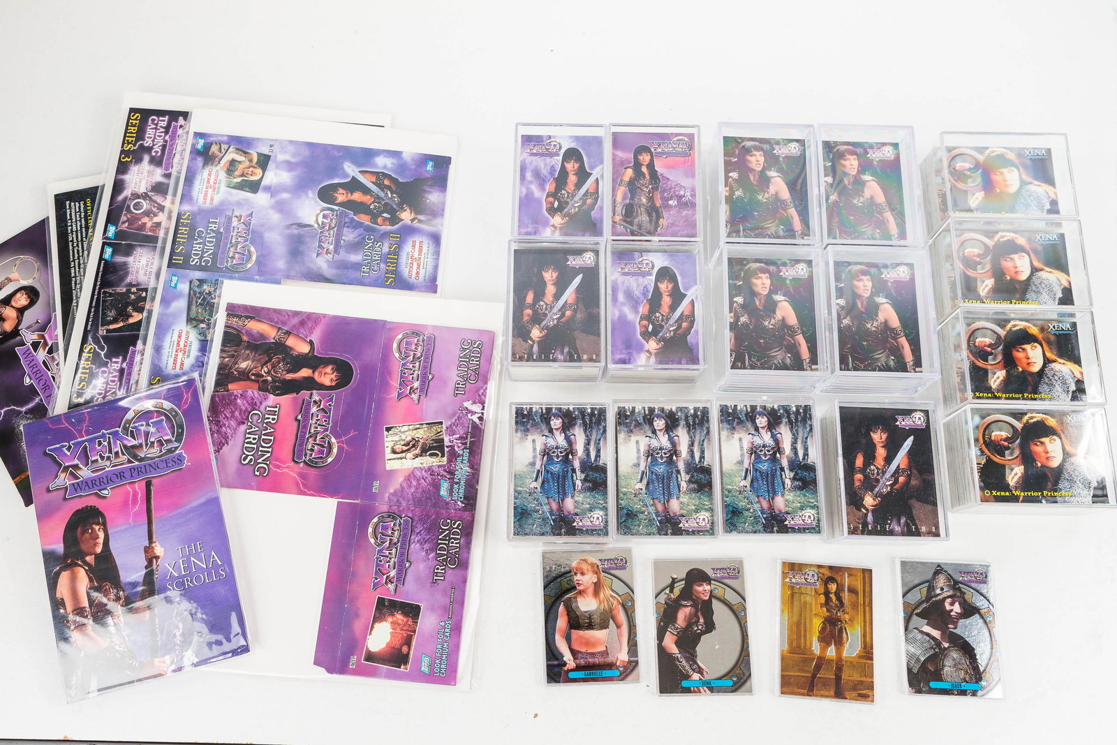Collector Cards / Xena: 16 sets of Xena cards in a variety of series; 4 foil/chromium cards, and a The Xena Scrolls; and 5 boxes.