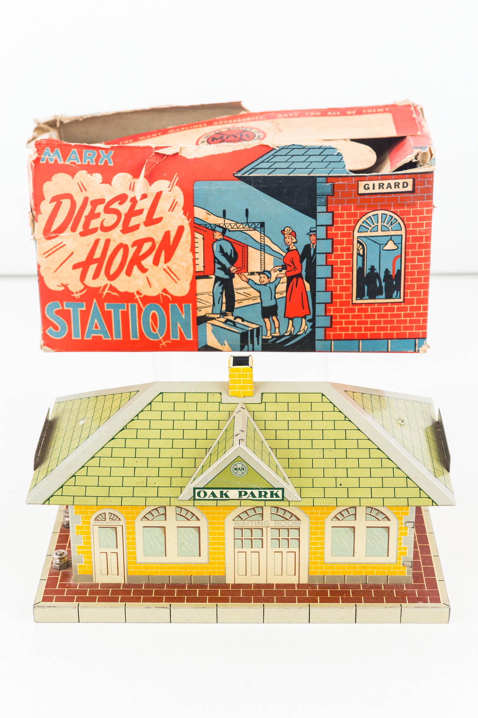 Marx Tin Litho Diesel Horn Station W/ Box: Marx Oak Park station. Toy is very clean. Box is damaged.