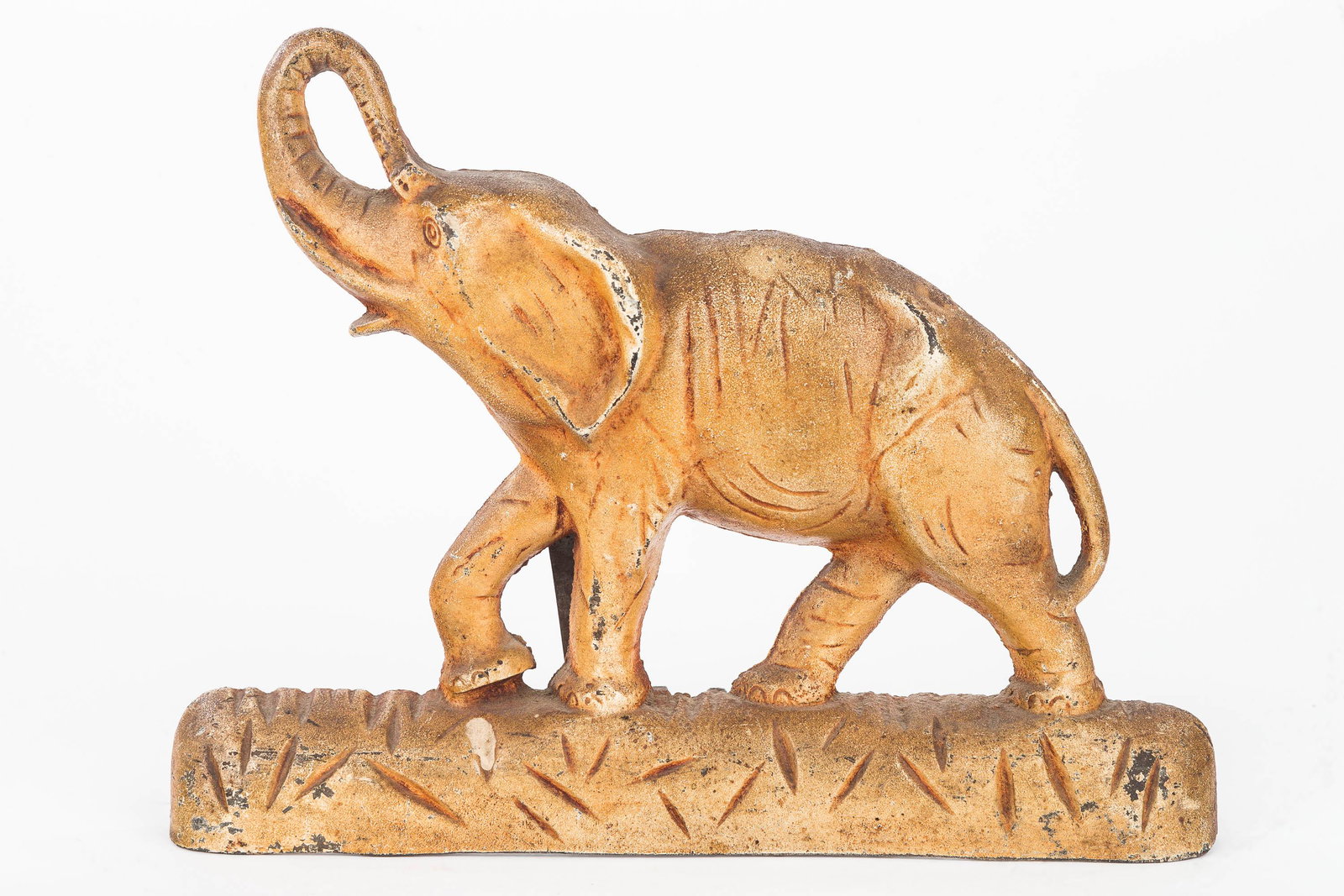 Vintage Elephant Cast Iron Door Stop: It stands approx 8.5" high and 11" long and has original painted surface. Stamped H8 on back.
