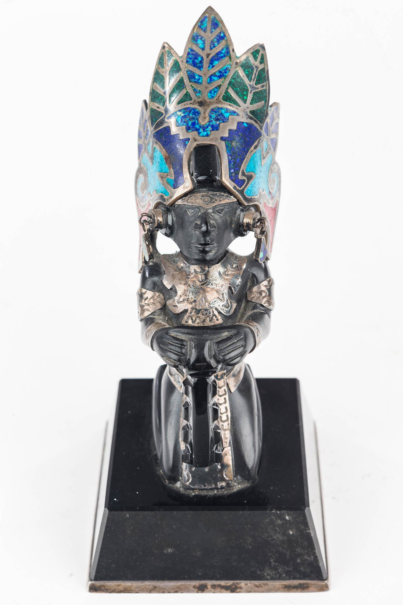 Vintage Sterling Inlaid Stone Warrior: Rare fine kneeling Mexican onyx warrior with ornate turquoise, red coral, lapis and malachite headdress with sterling silver designs and attire. Sitting atop fine onyx obsidian and sterling silver det
