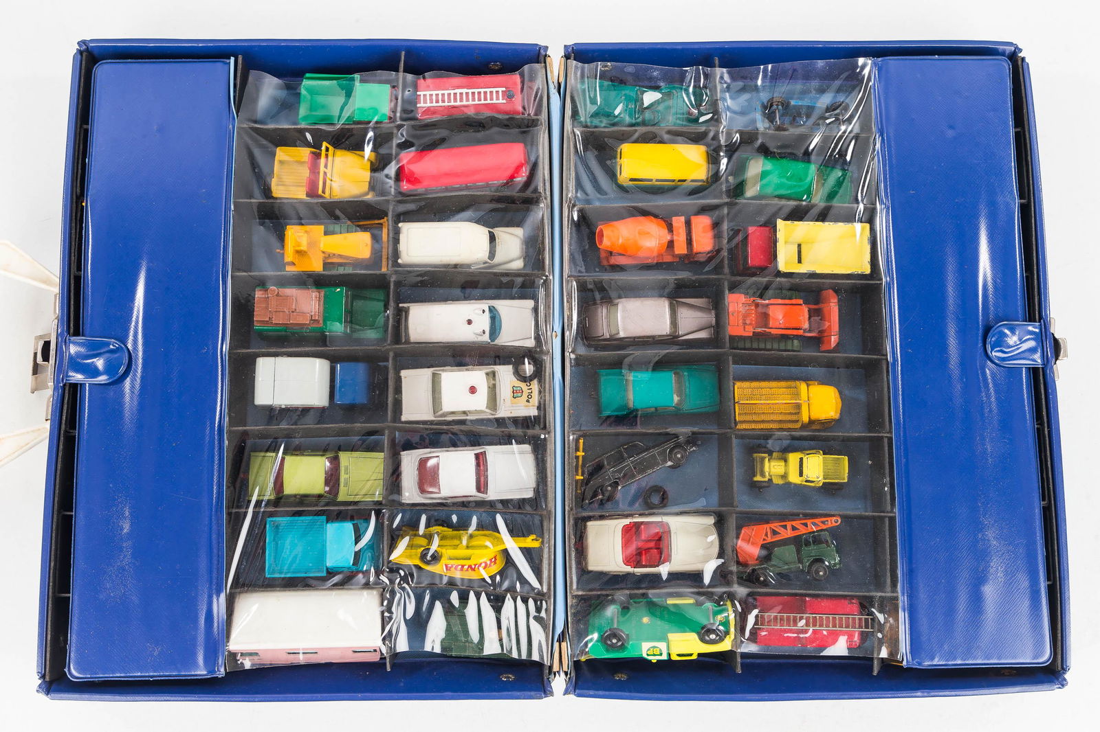 45 Lesney Matchbox 1960/70: There are 45 Lesney and 3 non-matchbox cars, most are clean and they come in a 1966 collectors case.