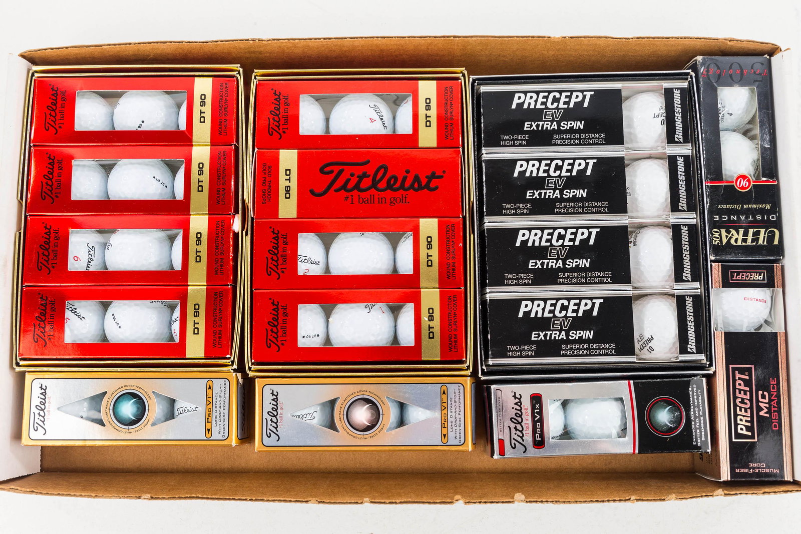 Titleist and Other Golf Balls NIP: Seventeen packs of golf balls NIP.