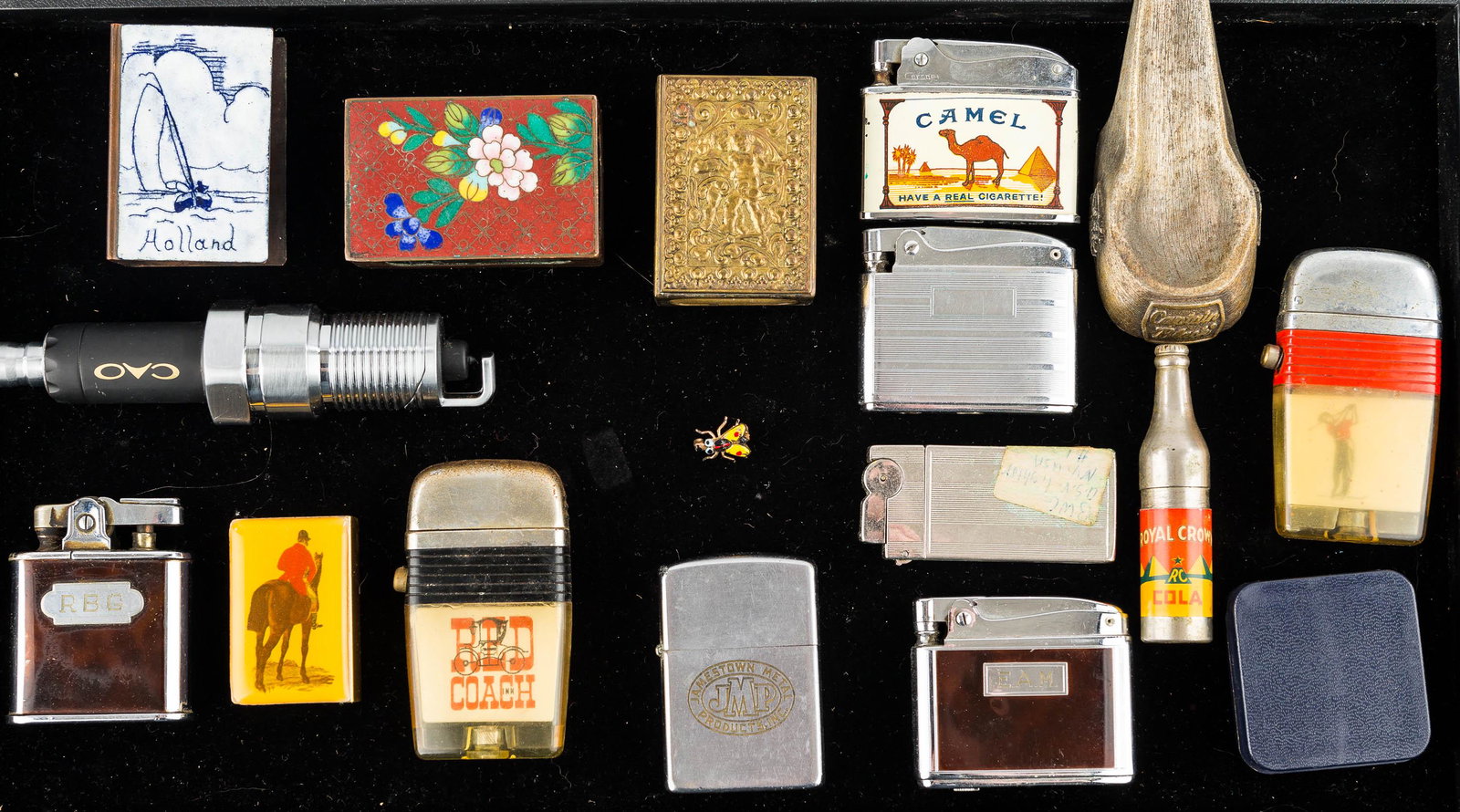 Vintage Lighters and Match Safes: Coronet Camel lighter, spark plug lighter, Ronson lighters, RC Cola bottle lighter and various match safes.