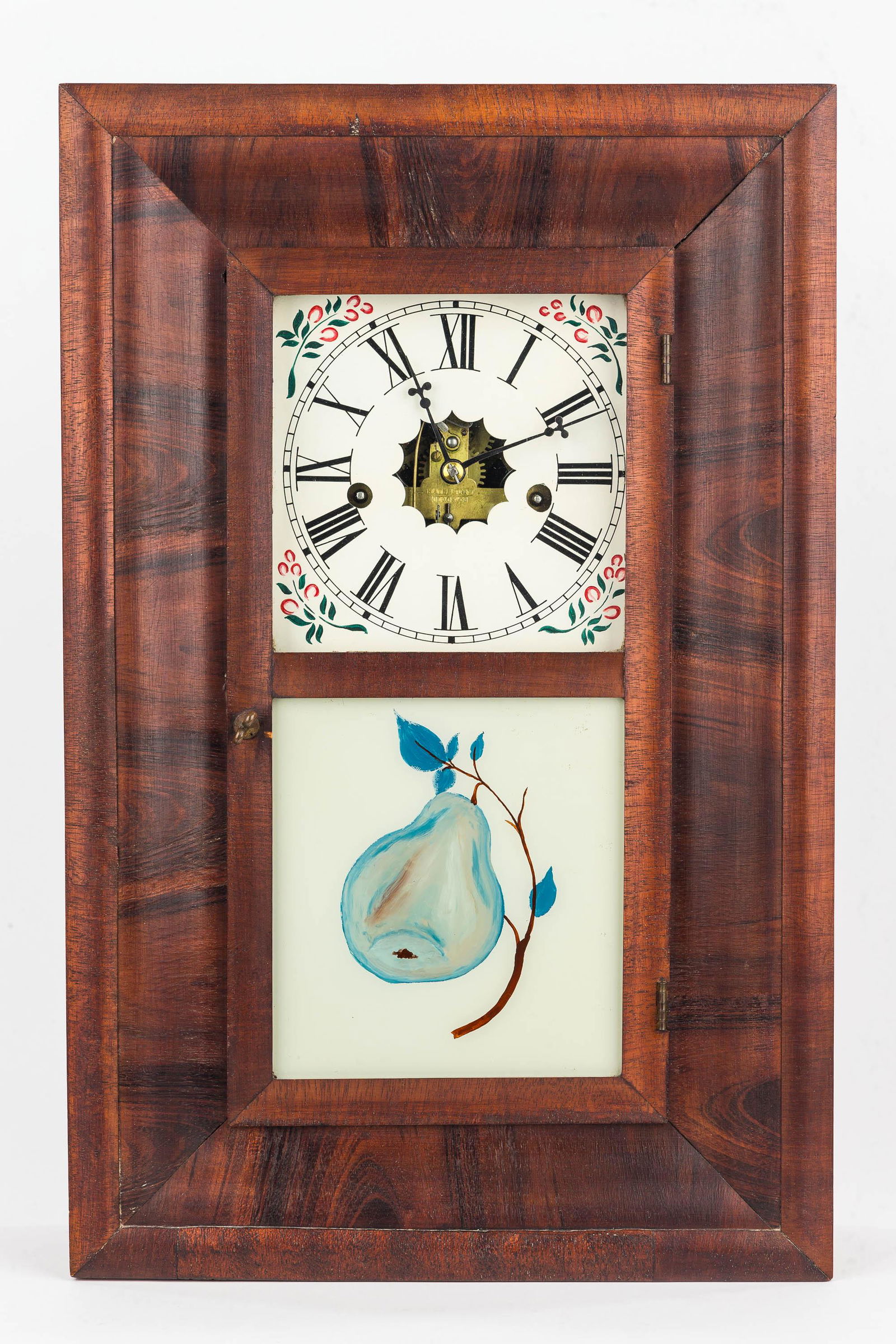 Waterbury 19th Century Ogee Clock: This Waterbury 19th C clock has a hand painted tin face, original interior label, pendulum and key, and a reverse painted pear that may be later. It measures approx. 18.5" H and is currently running (