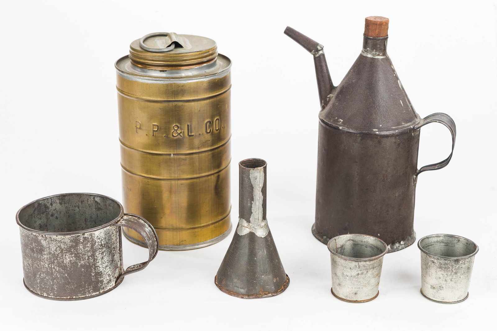 Tinware Including PP&L: There is a brass PP&L container measuring approx. 7.5" H, a tin fluid container, and other various tinware.