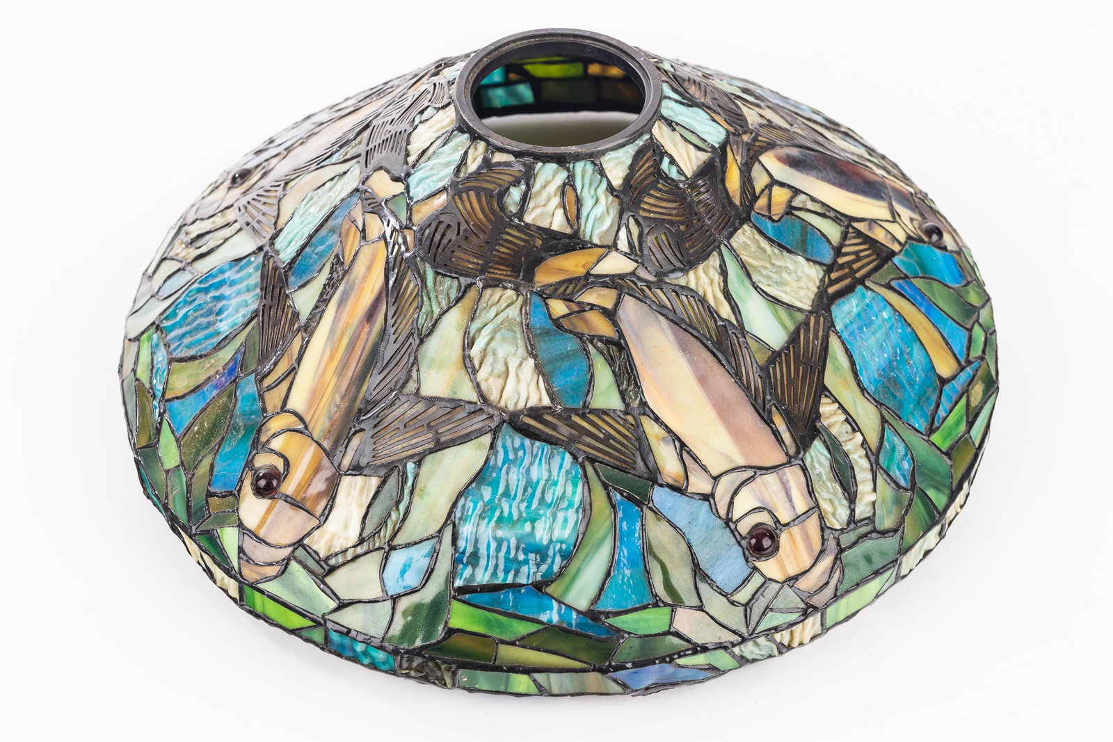Art Glass Lampshade With Flying Fish Motif: A multicolor stained glass lampshade with a flying fish design; measures approx. 7" high and 16" in diameter.