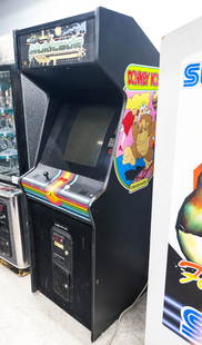 Full Size Arcade Game / Vintage: Classic "Multicade" Stand Up Arcade Game with Ms. Pac Man, Frogger, Donkey Kong, Mario Brothers and Asteroids. Item is working but not guaranteed. No key. Possible restorations needed.