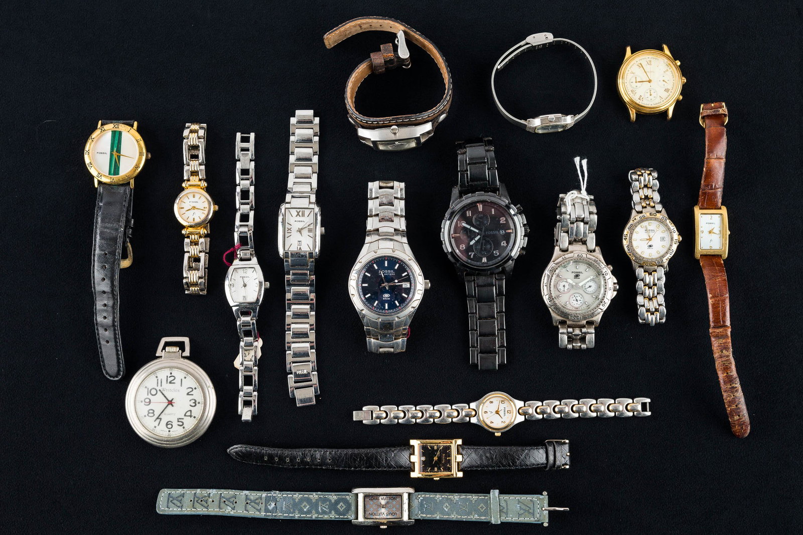 Men's and Ladies' Watch Collection: Men's watches include three Fossil Blue Chromatic; other men's and ladies' Fossil watches, a ladies' Bulova with goldtone face, a Westclox pocketwatch; majority of the watches are Fossil.