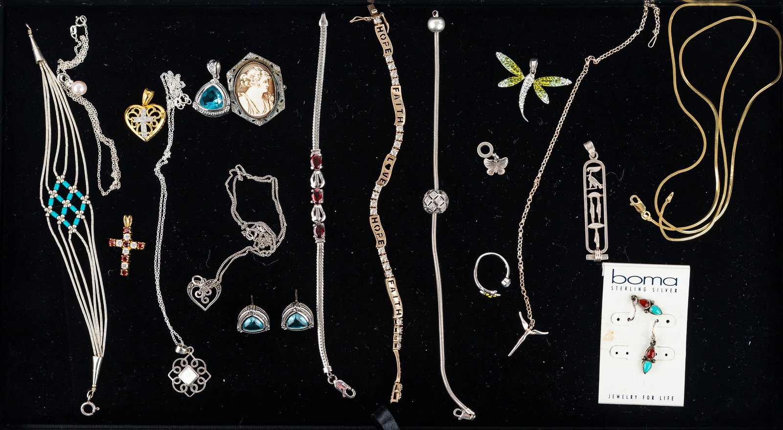 Sterling Silver Jewelry Grouping: Lot includes various bracelets and necklaces, a Victorian cameo, a rhinestone dragonfly, and other sterling jewelry.