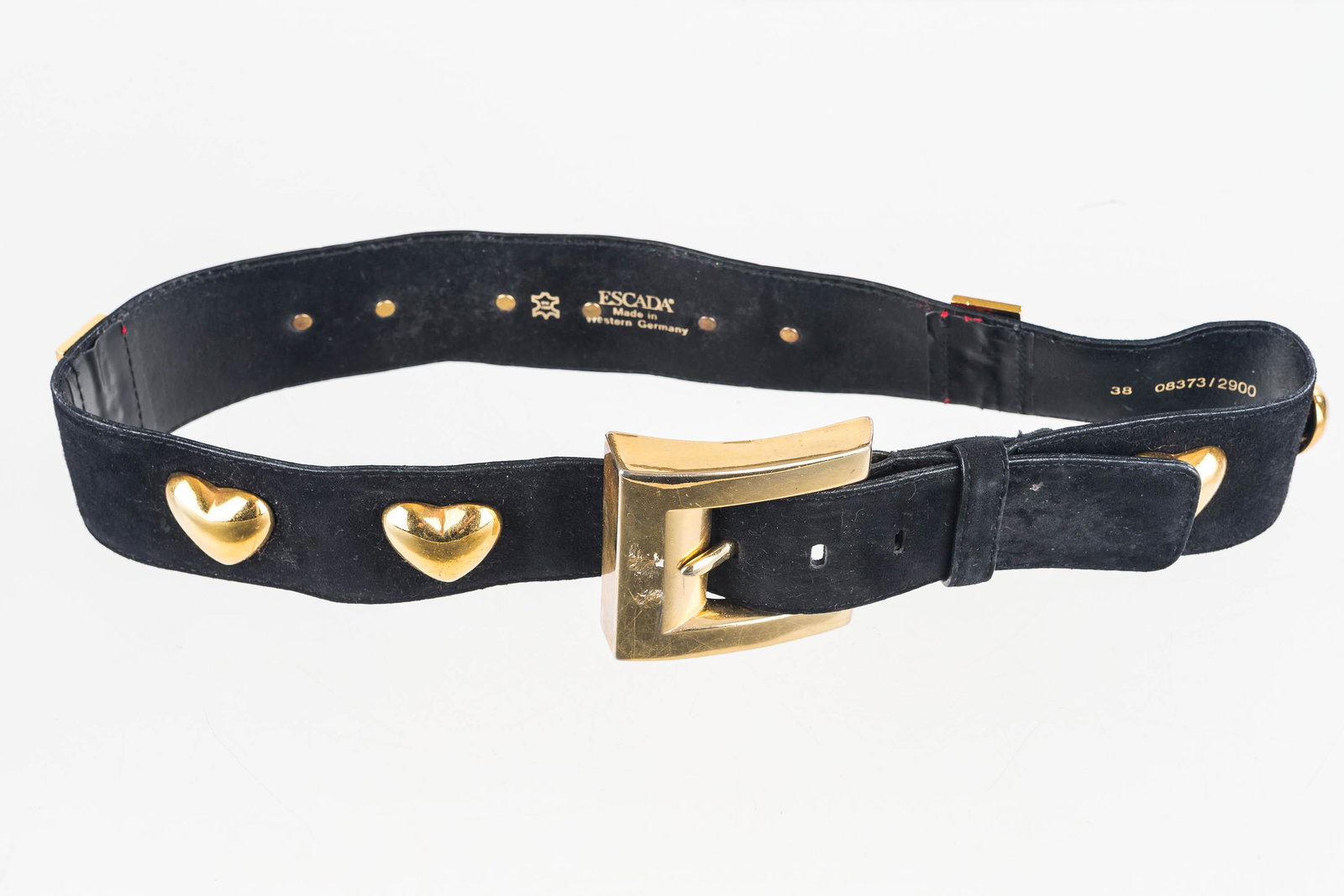 Designer Escada Belt: Vintage Escada black suede and red leather belt embellished with brass lips and hearts and extra large brass buckle. Escada sz 38 Western Germany.