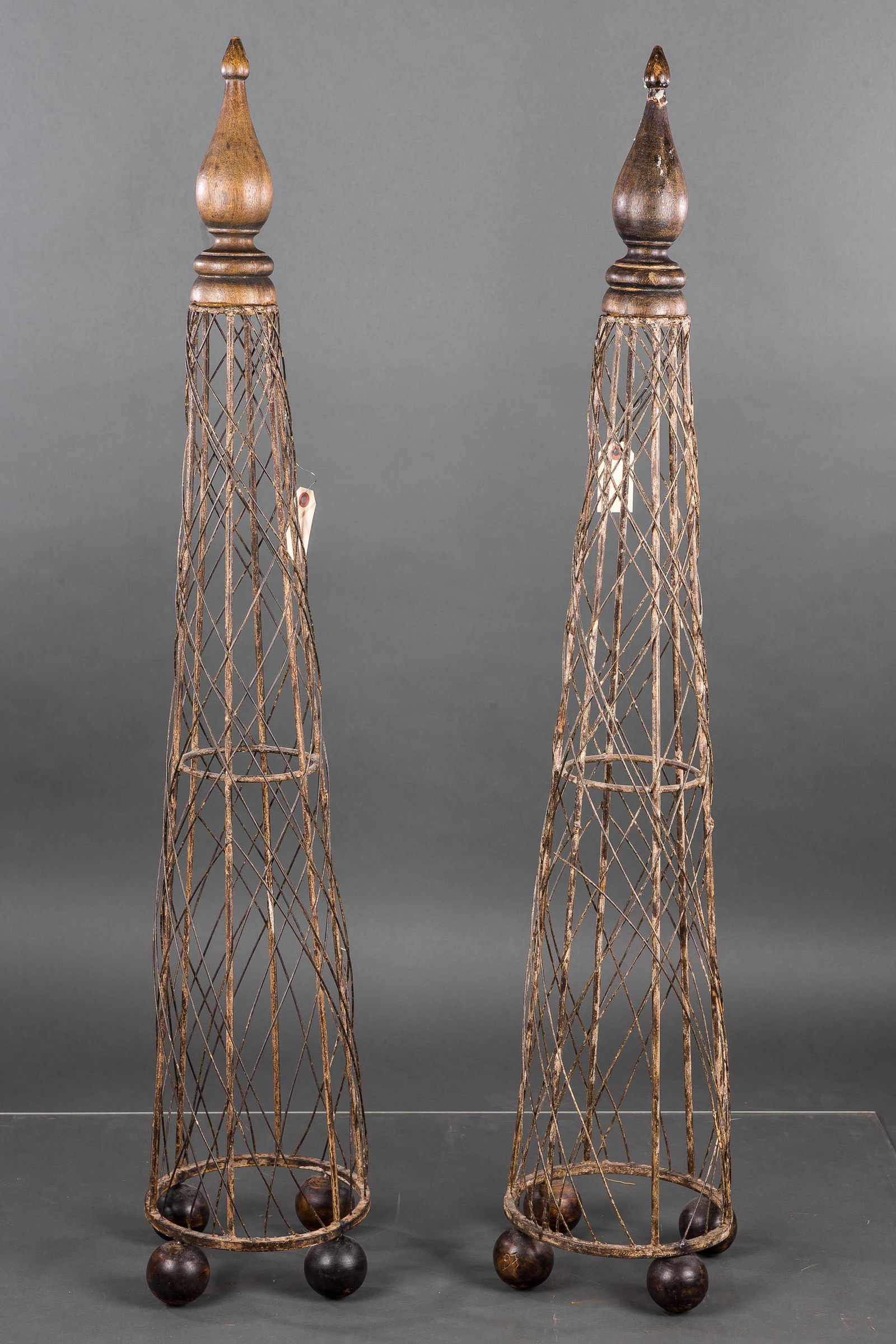 English Ivy Garden Obelisks: Obelisks are wire construction with wood finials (one finial repaired) and measure approx 48" H.