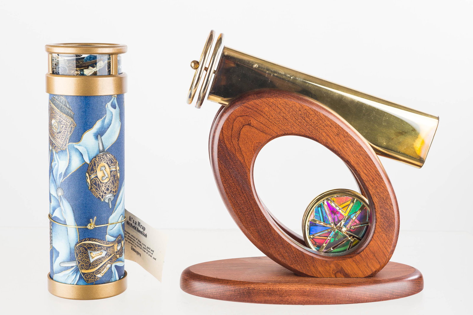 Chesnik Kaleidoscope and Another: Chesnik Scope comes with two extra disks and has a wooden postmodern style frame. It is signed and dated 1991 and measures approx. 9 1/2" L. Lot also includes a Hanukkah scope made by Images.