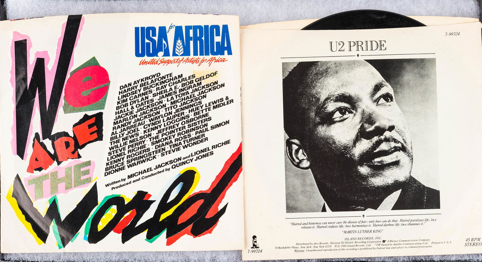"U2 Pride" and "We Are the World" 45s (1 of 3)