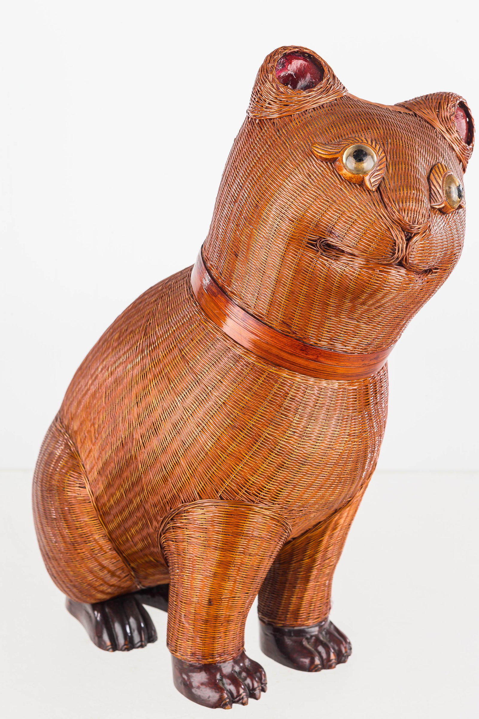 Vintage Shanghai Wicker Cat Container: Cat is finely woven bamboo wicker with bamboo feet. It has applied eyes and a painted composition interior. It measures approx. 12" high, and the paper label is lost.
