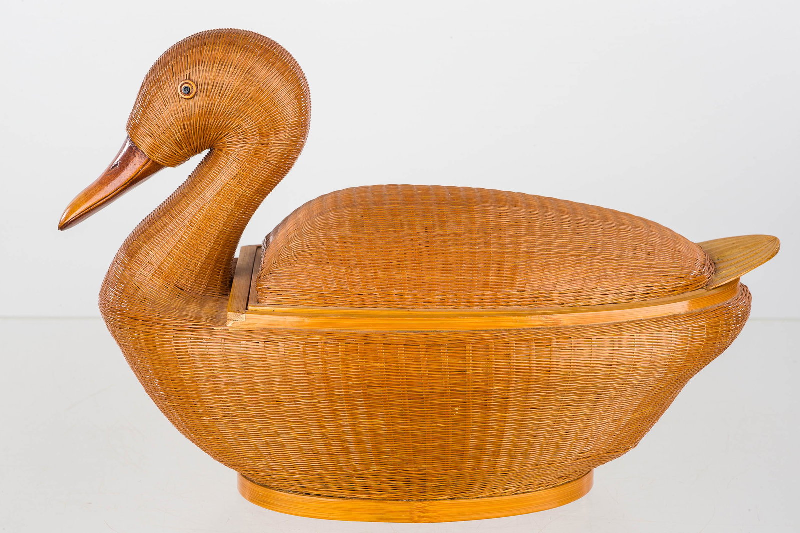 Large Shanghai Bamboo Wicker Duck (Vintage): This is constructed from tightly woven bamboo wicker, has applied bamboo eyes, and the back lifts off the reveal a container. Item retains partial Shanghai Handicrafts tag and measures approx. 9.5 H x