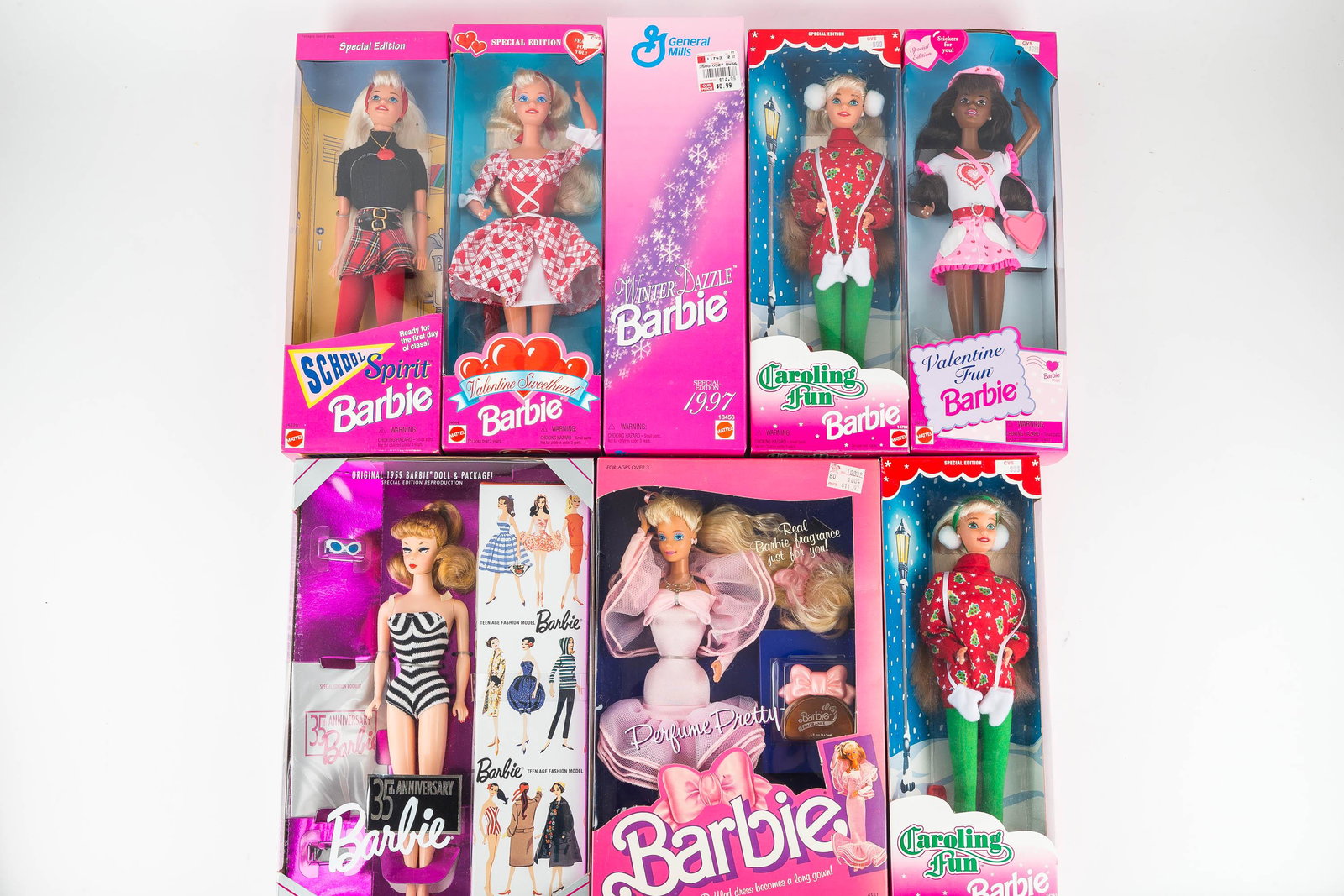 Mixed Barbie Grouping 1980's & 1990's: Eight various Barbies dating from 1987 to 1997. All new in box.