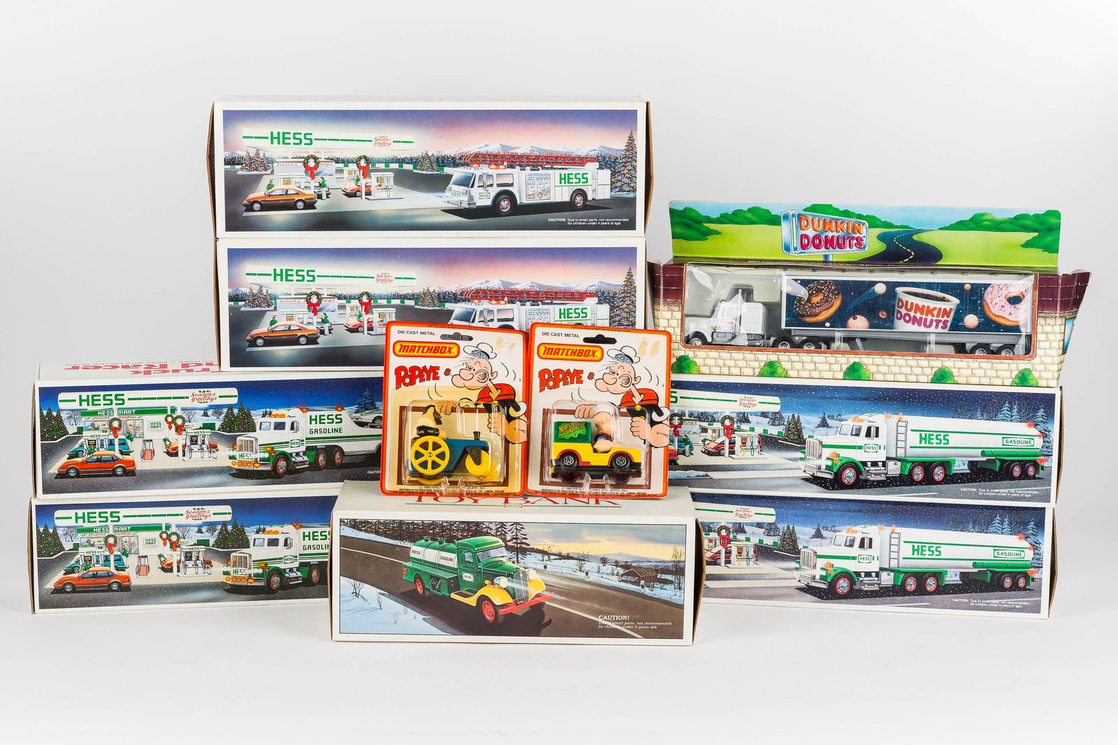 Seven Hess Trucks and Other Vehicles (1 of 1)