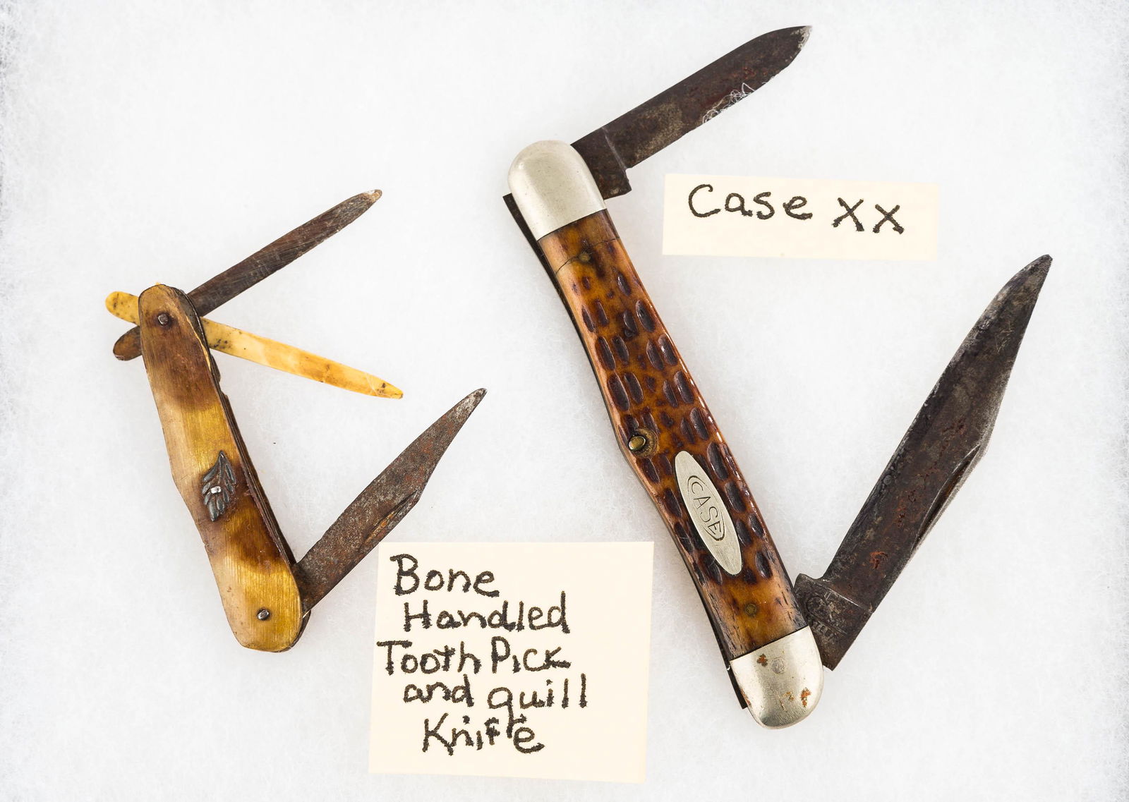 Case XX Folding Knife and Another: A Case XX two-blade folding knife and a Civil War era bone-handled folding knife with toothpick and quill.