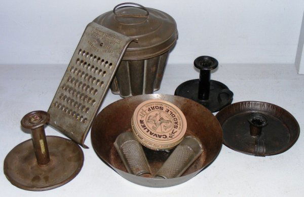 Tinware: Tinware including large mold, 3 chamber sticks, 3 graters, etc.