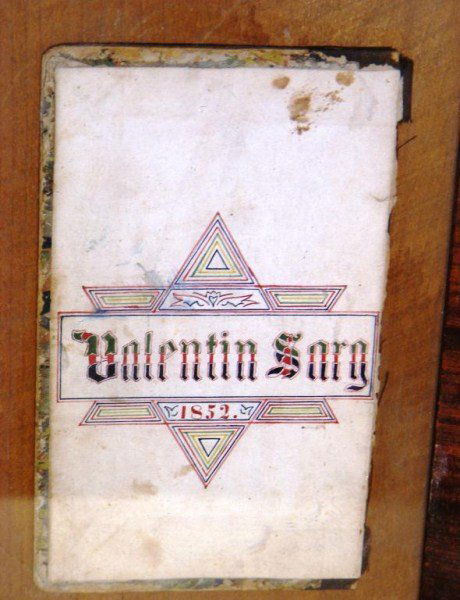 Mid 19th C Folk Art: Mid 19th C folk art pen and ink on book interior dated 1852 in original frame;two oak leaf cornered arts and crafts period frames, W Duke & son tobacco card