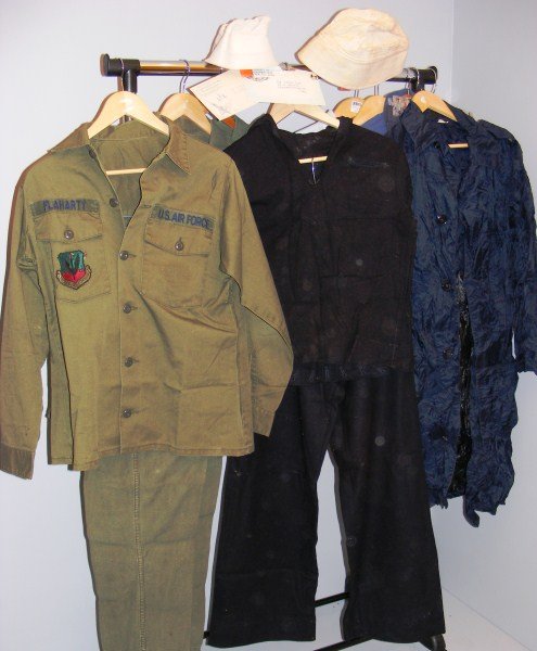 Air Force & Navy WWll items: Items belonging to Kevin C. Flaharty (U.S. Air Force), Kevin Watts (U.S. Navy Seabees), WWll Navy Uniform, Insignia, Patches, Raincoat, Air Force Cup, etc., approx. 29 pieces