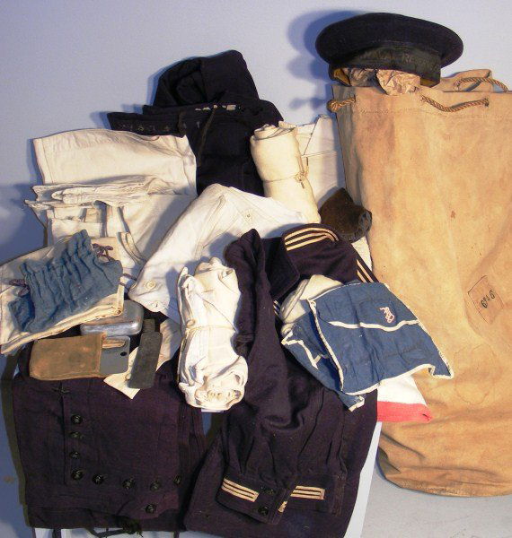 WWI Personal Items: WWI Personal Items of "Seaman J.W. Young US Navy including 2 jumpers, 1 dress and 1 under dress, 3 white jumpers, 3 pr of Bells, 1 blue and 2 white, 1 Blue Flat Hat, 2 Underwear Tops, 1 Underwear bott