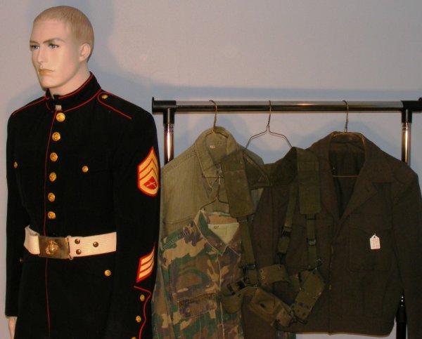 Vietnam and Korean War USMC: Vietnam and Korean War period USMC Grouping including dress blues, white bell and buckle, IKE jacket, field jacket, HTB fatigue shirt and web belt (manikin not included)