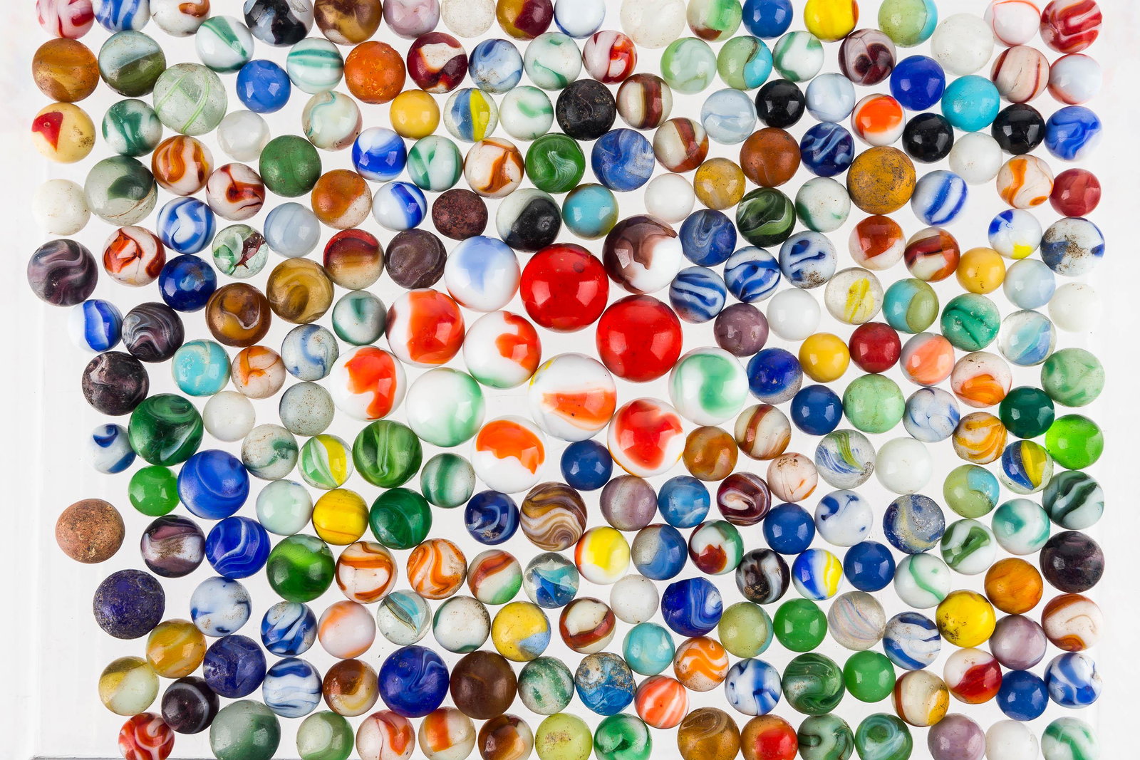 Mixed Marble Collection: knucklers, agates, colorful swirls, and others. Various ages and conditions.
